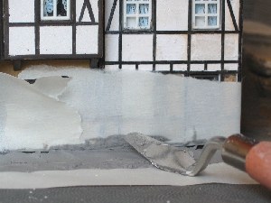 Gips-Arbeiten am Gehweg